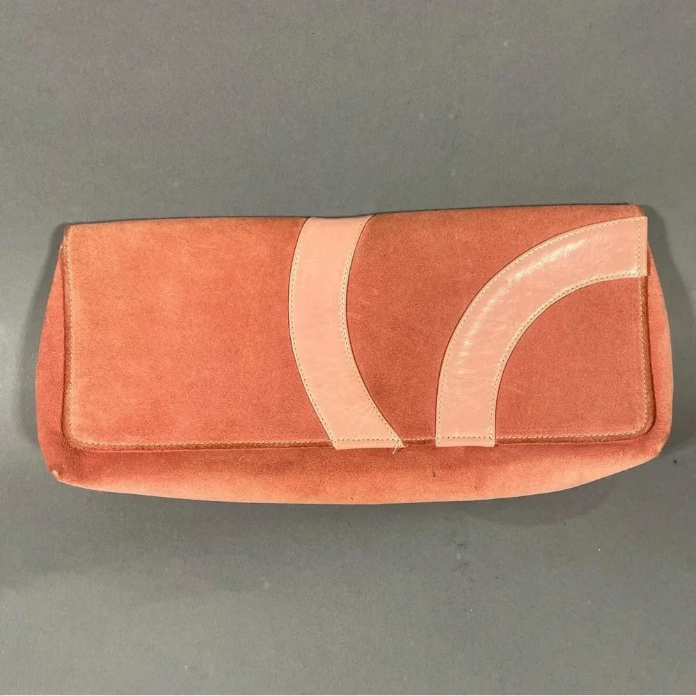 Pink Suede leather clutch hand bag. Magnetic closure and inside pocket.